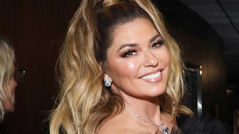 Shania Twain exposes bare chest in see